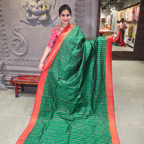 Fancy banaras bottle green saree