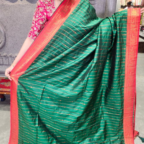 Fancy banaras bottle green saree