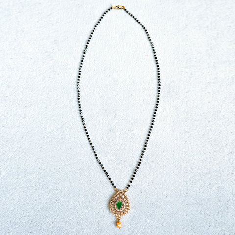 Black beads (green stone)